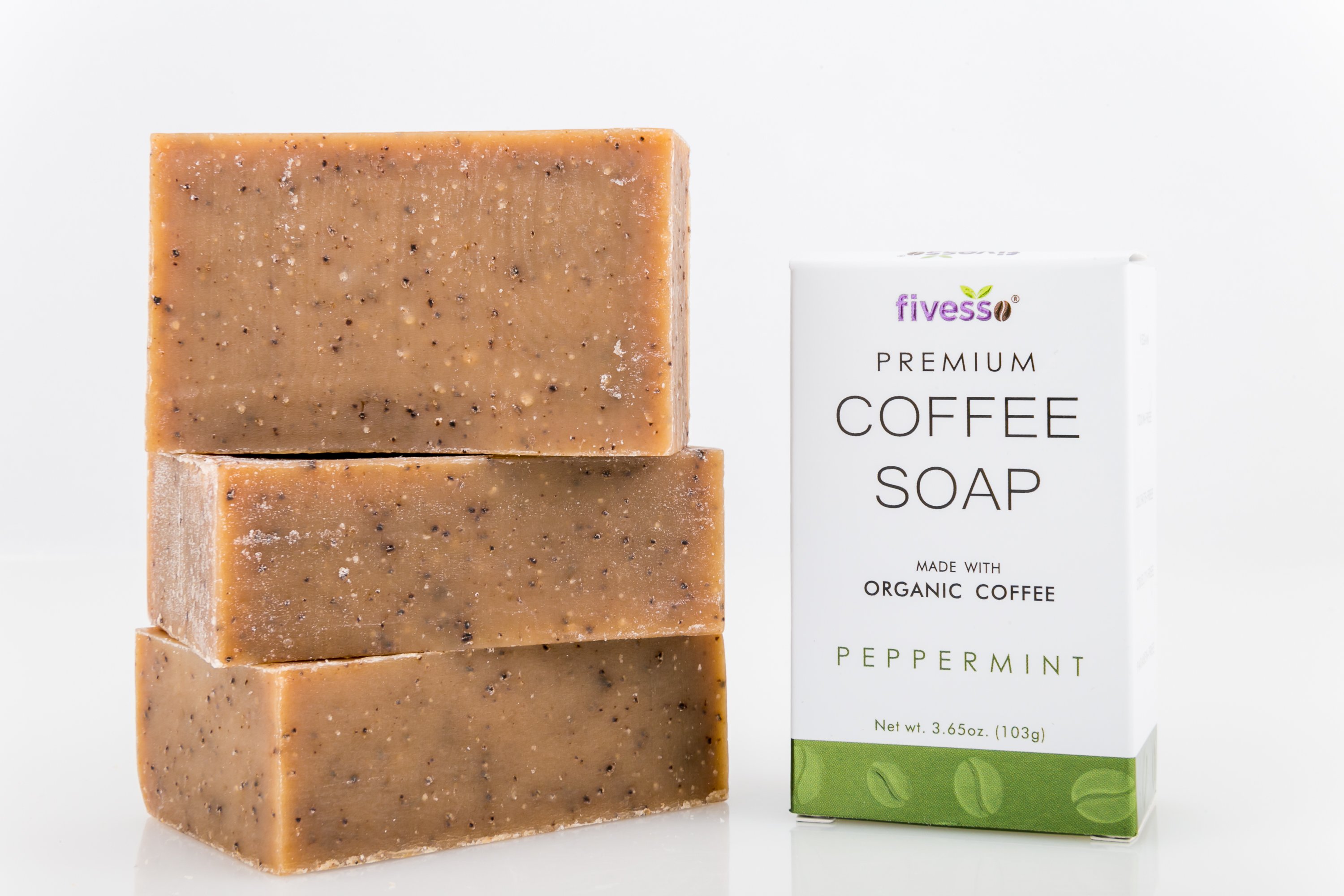 Three Peppermint Premium Coffee Soap Bars stacked, showcasing their rich texture and organic ingredients, perfect for exfoliating and moisturizing skin.