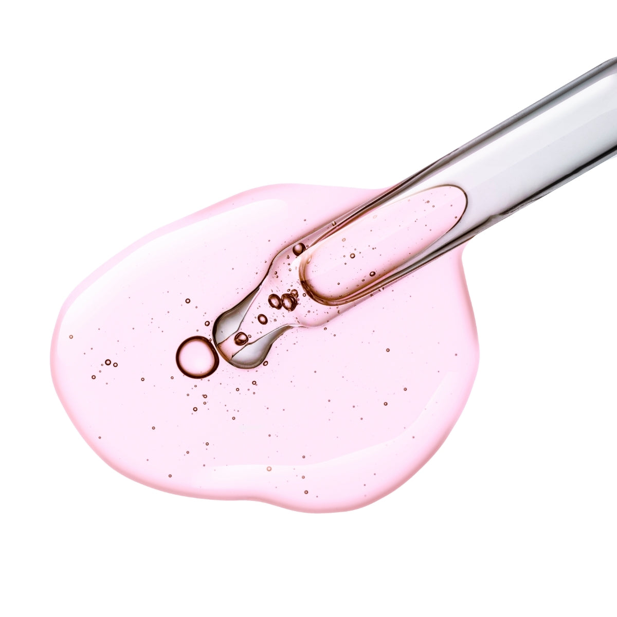 A bottle of pink anti-stress facial serum with botanical extracts, featuring a sleek design and a dropper for easy application.