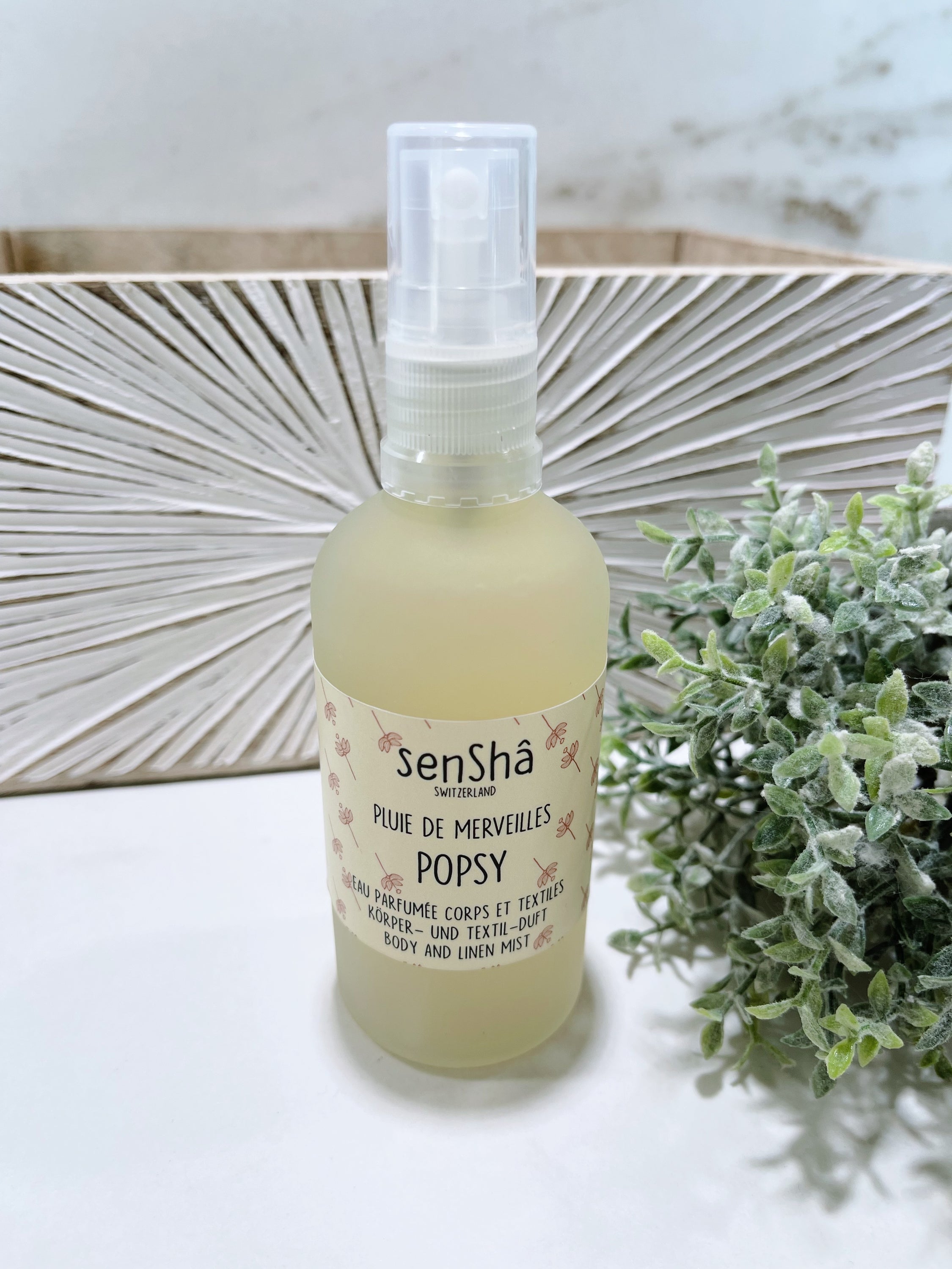 Popsy 100ml - Pluie de Merveilles, a delicate eau parfumée in a stylish bottle, perfect for body, textiles, and hair.