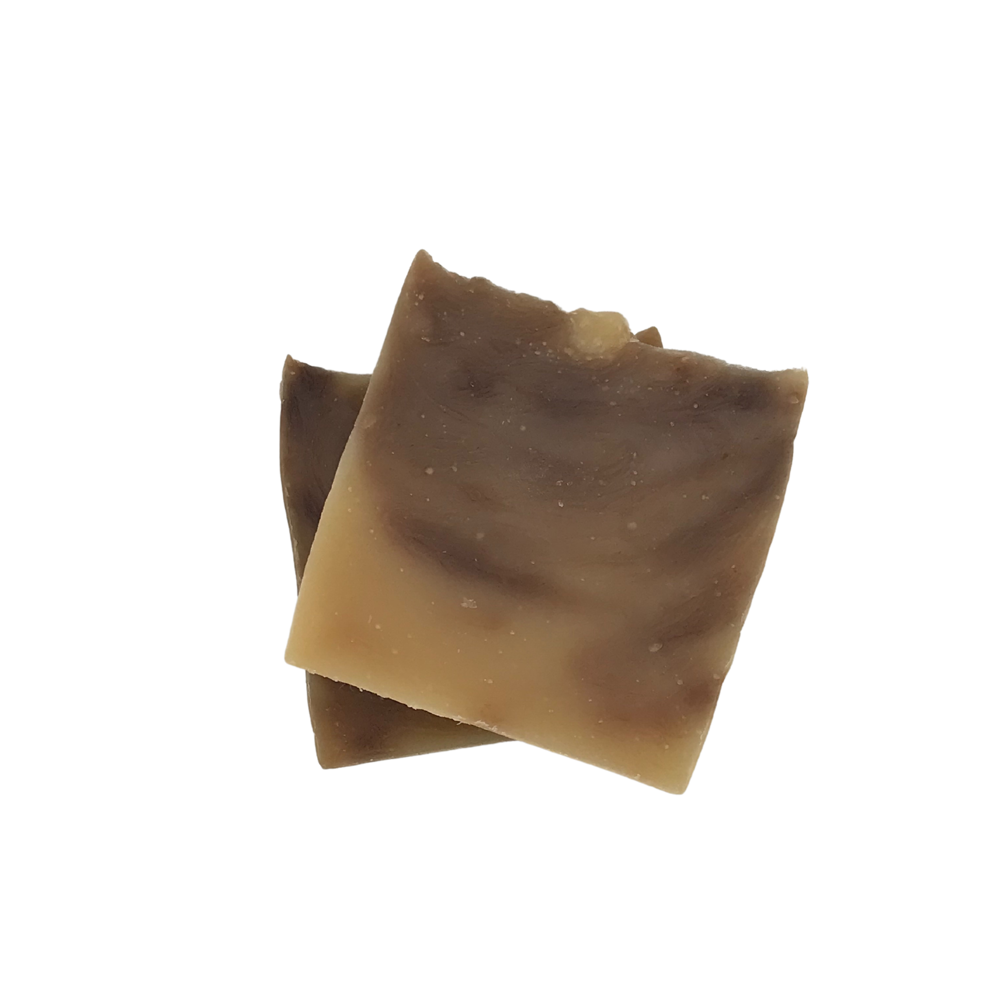 A bar of Rice Milk and Honey Soap with a creamy texture, showcasing its natural ingredients and inviting fragrance.