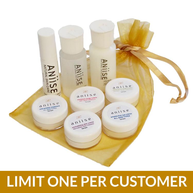 Aniise Skin Care Sample Pack featuring eight product samples including moisturizers, serums, and cleansers in elegant packaging.