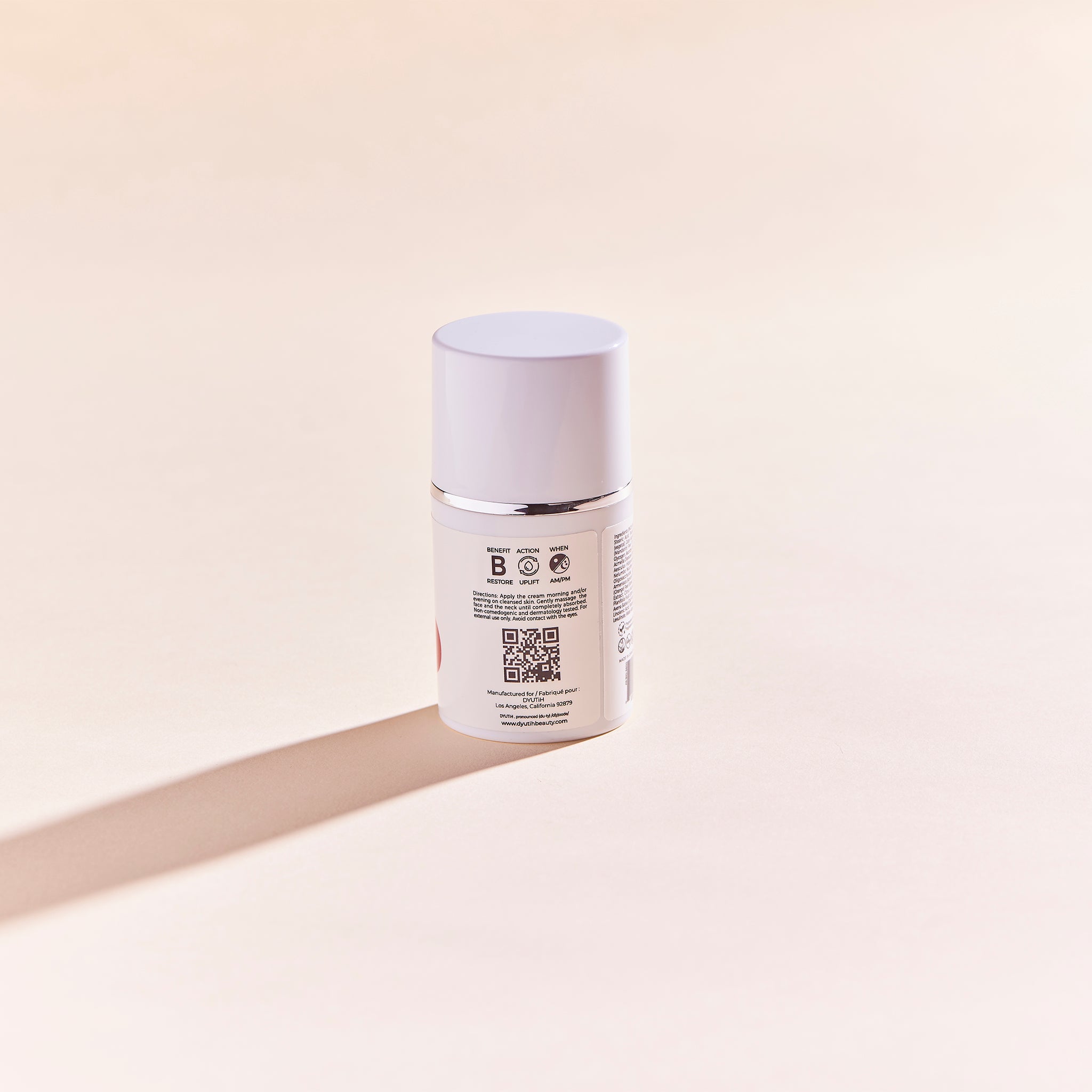 DYUTIH Organics SKIN RENEWING Regenerating Moisturizer bottle with a sleek design, showcasing its organic ingredients and cruelty-free label.