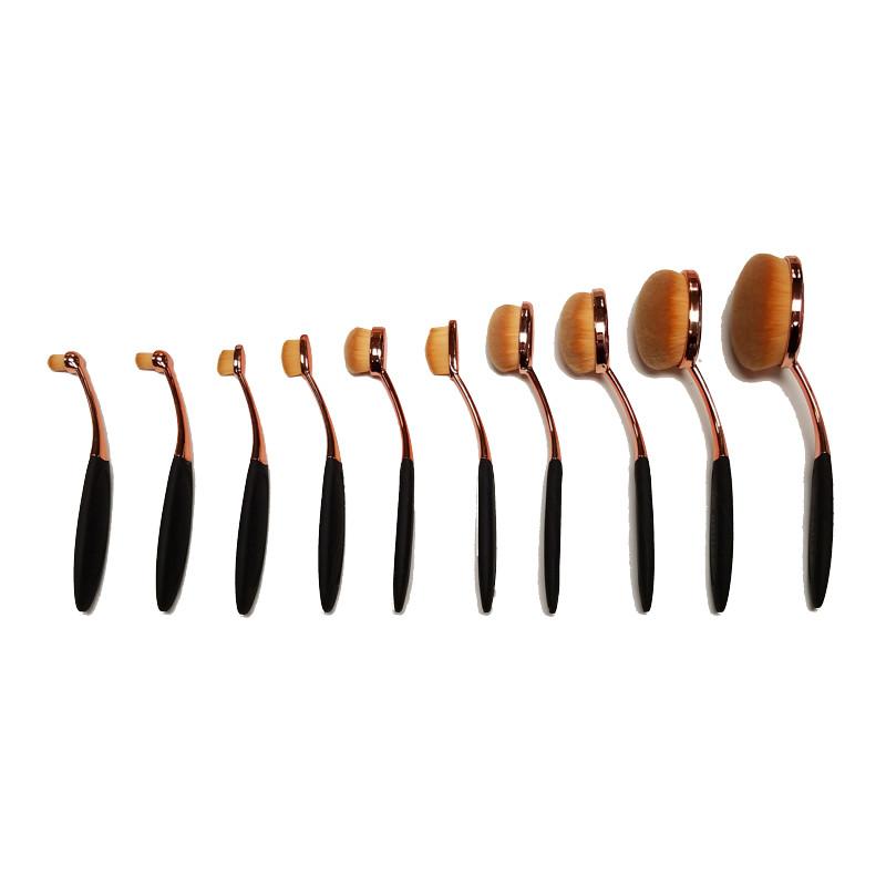 A 10-piece synthetic oval makeup brush set with elegant design and soft bristles for flawless makeup application.