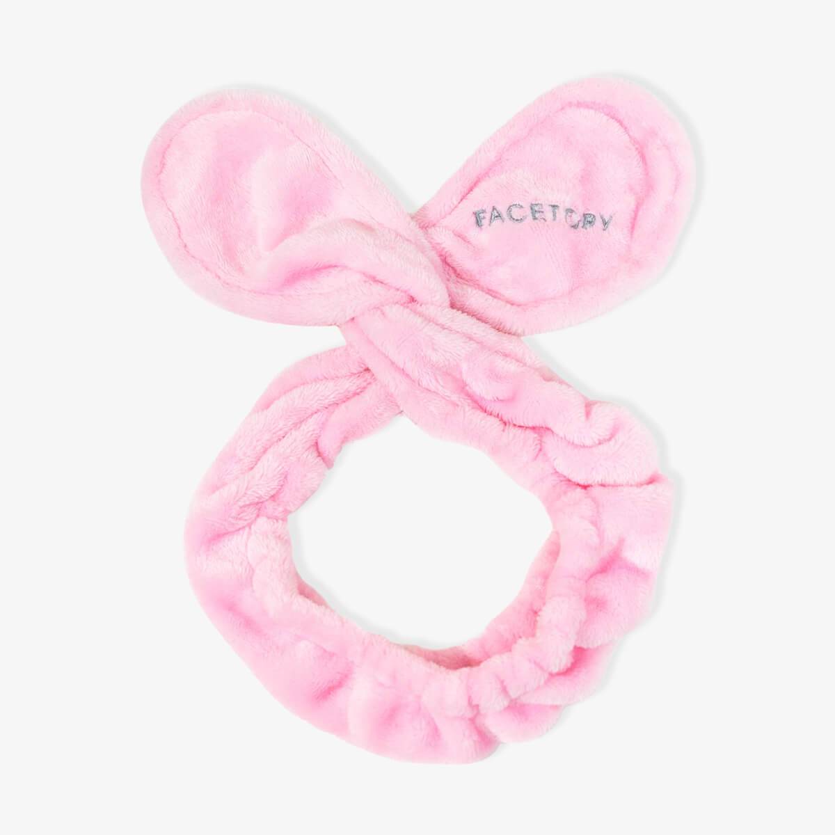 Tory Twist Hairband in Blushing Pink, featuring a soft stretchy design and embroidered FaceTory logo, perfect for skincare routines.