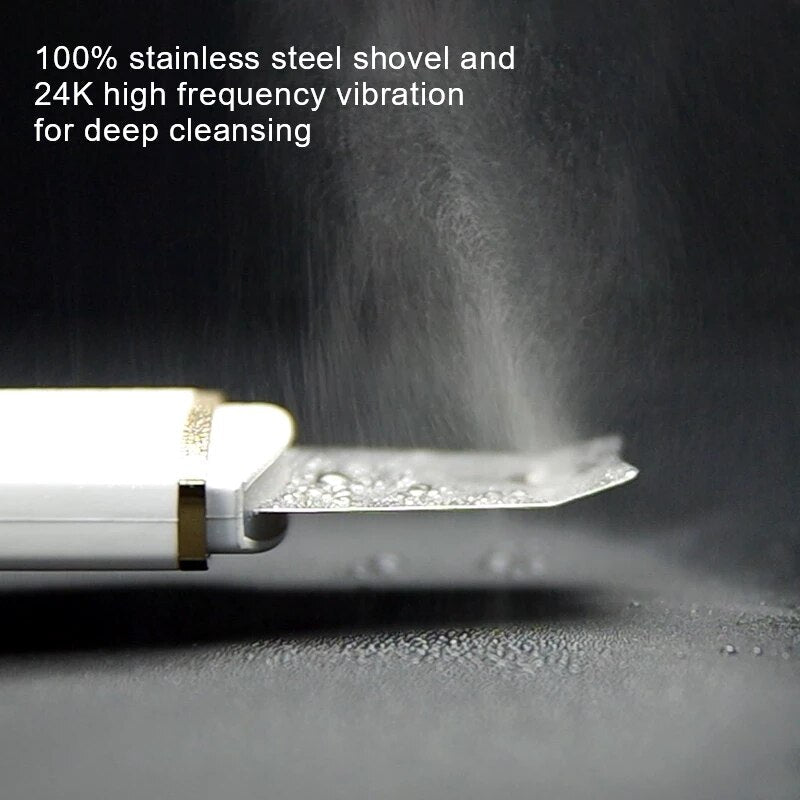 Ultrasonic Skin Scrubber with stainless shovel head and USB charging line, designed for deep facial cleansing and rejuvenation.