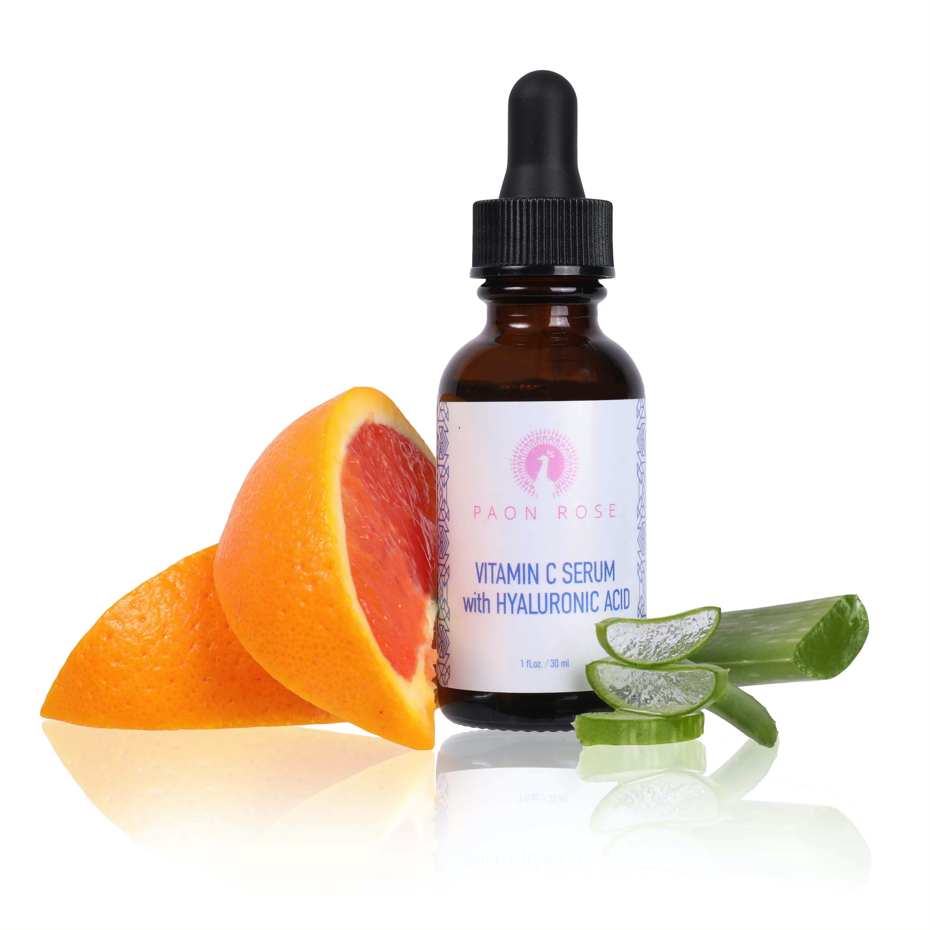 A bottle of Vitamin C Serum with Hyaluronic Acid, featuring a dropper and surrounded by natural ingredients like Aloe Vera and Jojoba Oil.