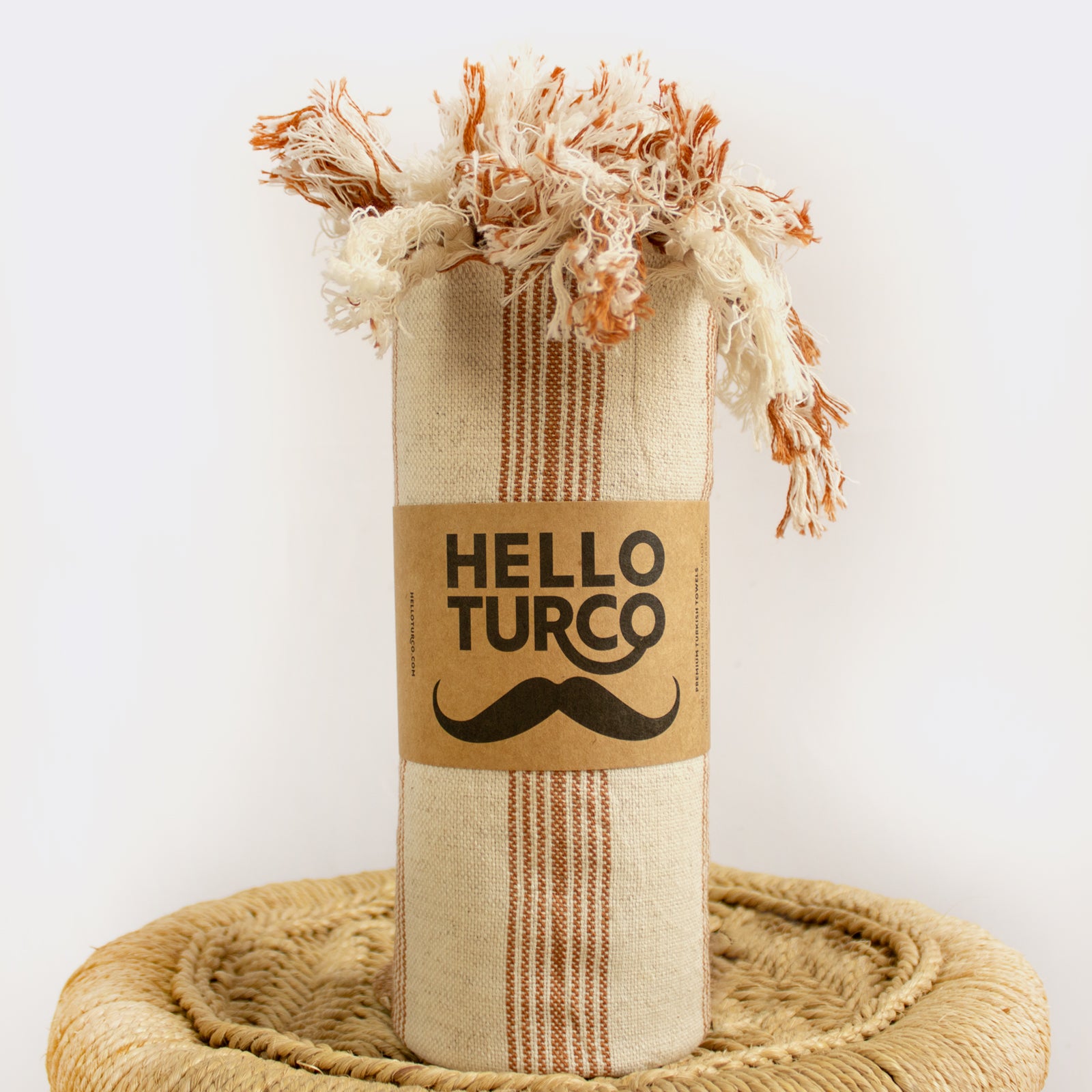 Ada Handwoven towel in earthy tones, showcasing traditional Turkish peshtemal design and organic cotton texture.