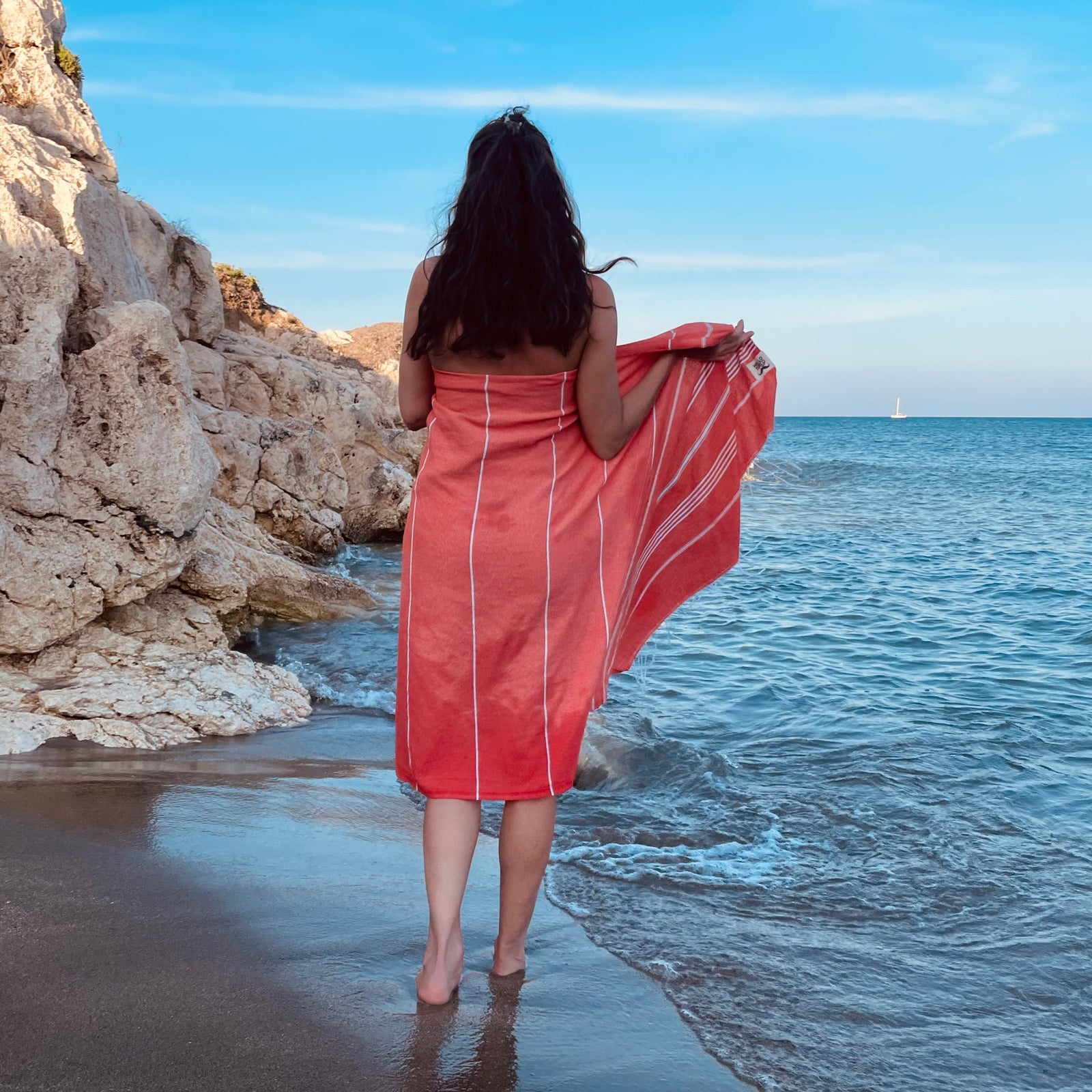 Coral 'BEACH PLEASE' embroidered Turkish towel, lightweight and sand-free, perfect for beach outings and versatile uses.