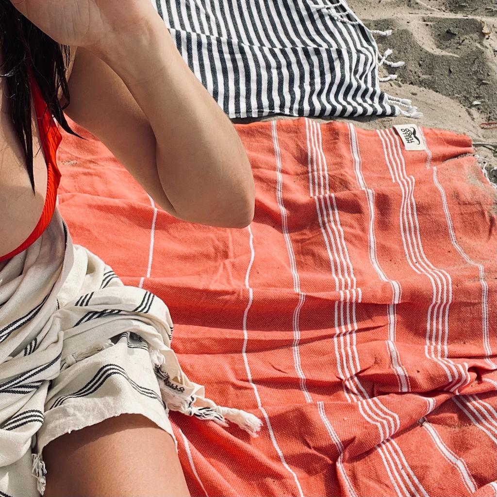Coral 'BEACH PLEASE' embroidered Turkish towel, lightweight and sand-free, perfect for beach outings and versatile uses.