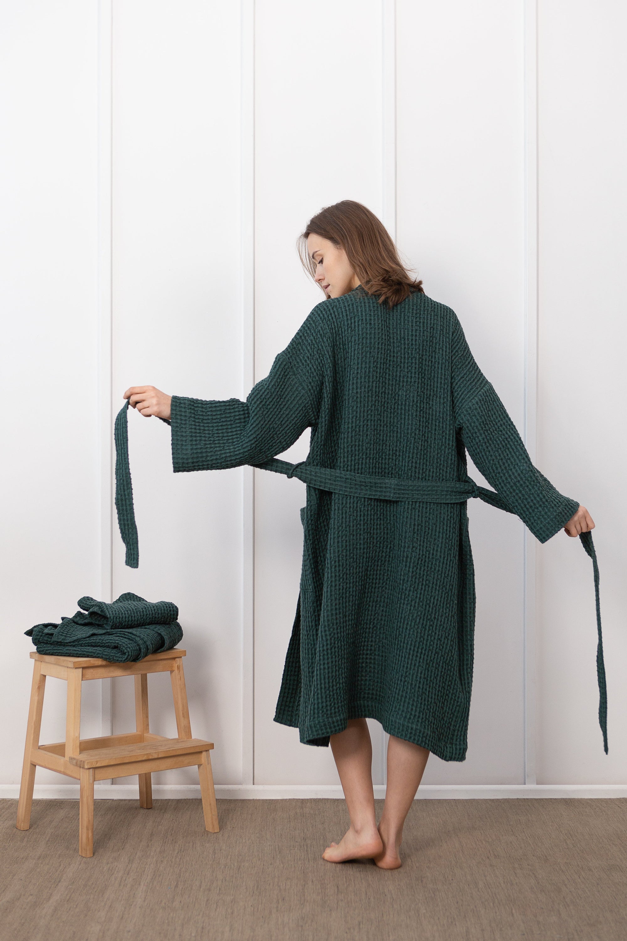 Greyish Green linen waffle robe for men, showcasing its soft texture and stylish design with two front pockets.