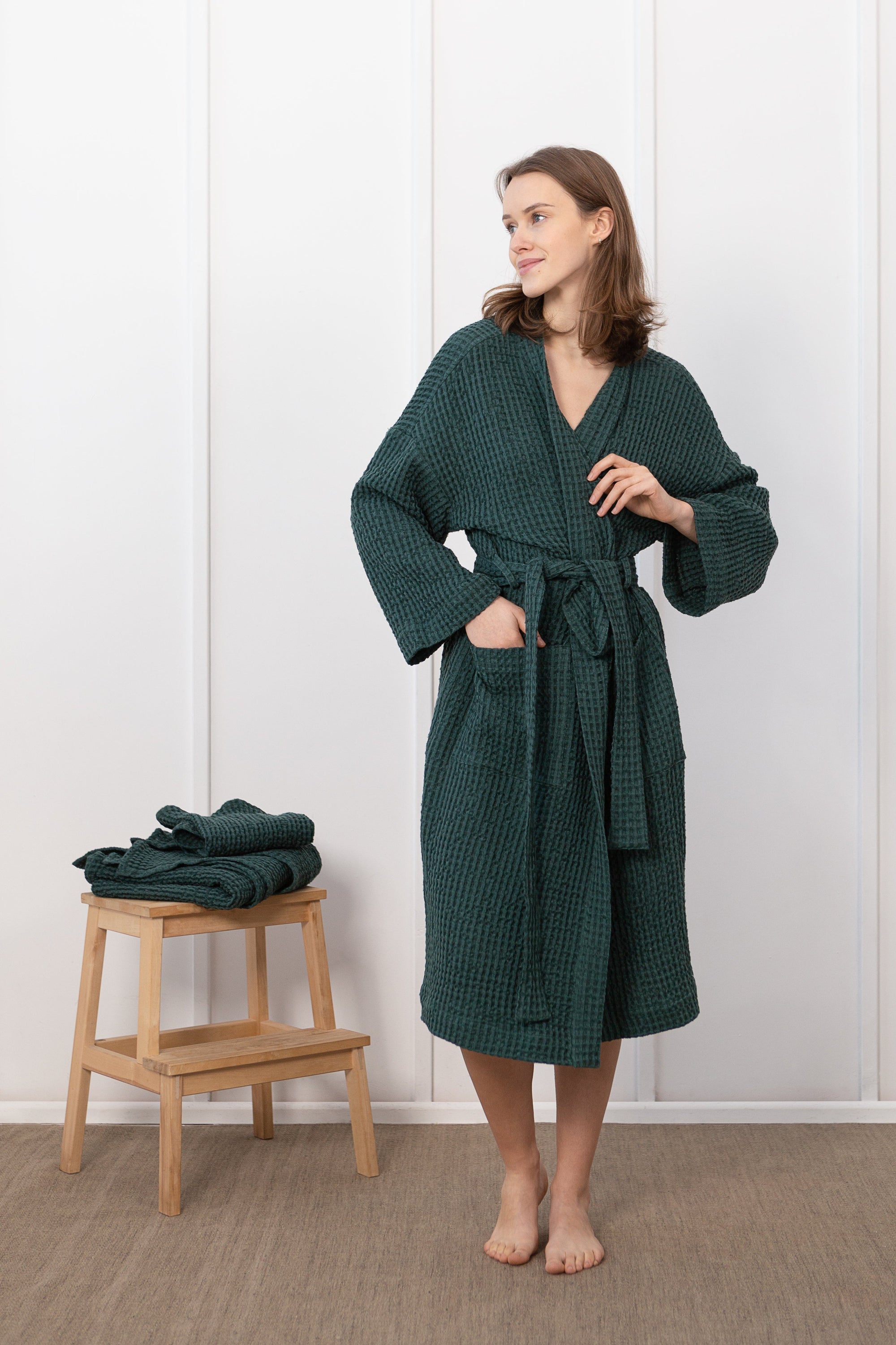 Greyish Green linen waffle robe for men, showcasing its soft texture and stylish design with two front pockets.