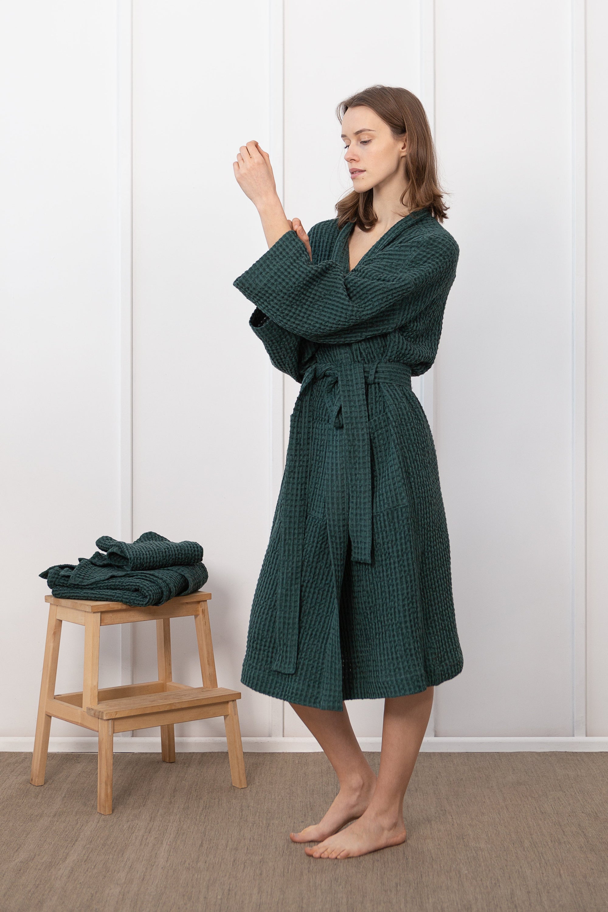 Greyish Green linen waffle robe for men, showcasing its soft texture and stylish design with two front pockets.