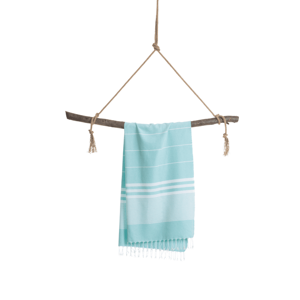 Turquoise Malibu Hammam Towel made from 100% cotton, elegantly packaged in a recycled gift box, perfect for travel and eco-conscious consumers.