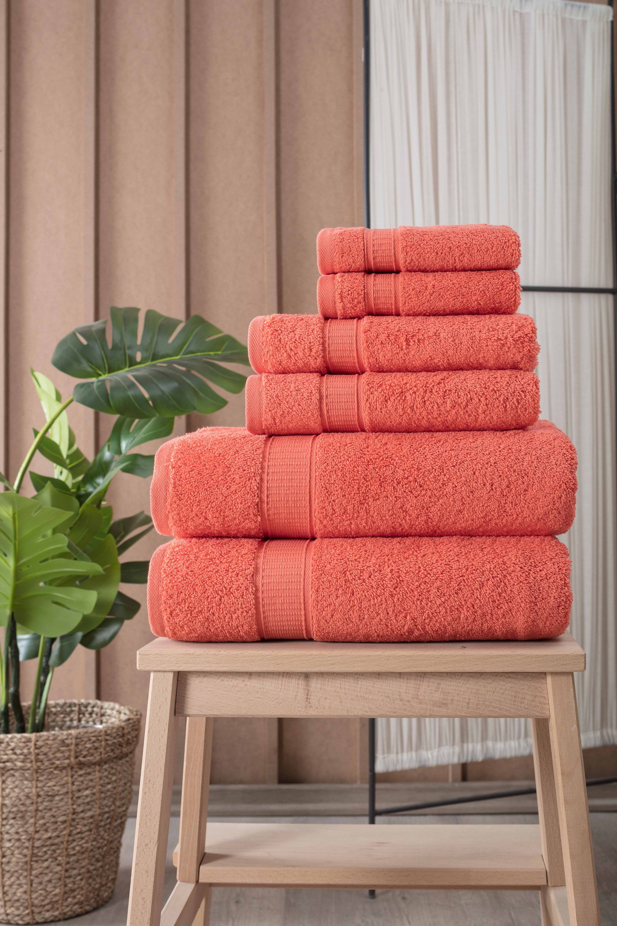 A luxurious set of 6 Turkish cotton bath towels in vibrant colors, showcasing their softness and dobby border design.