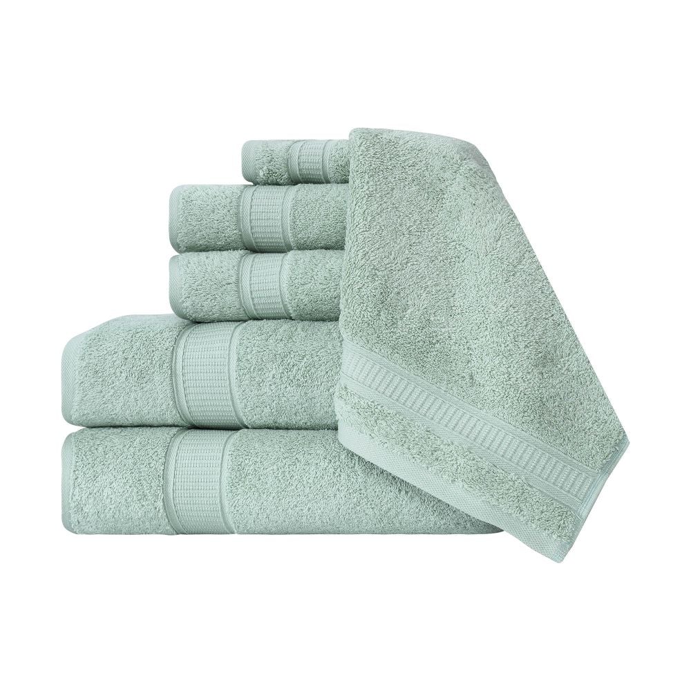 A luxurious set of 6 Turkish cotton bath towels in vibrant colors, showcasing their softness and dobby border design.