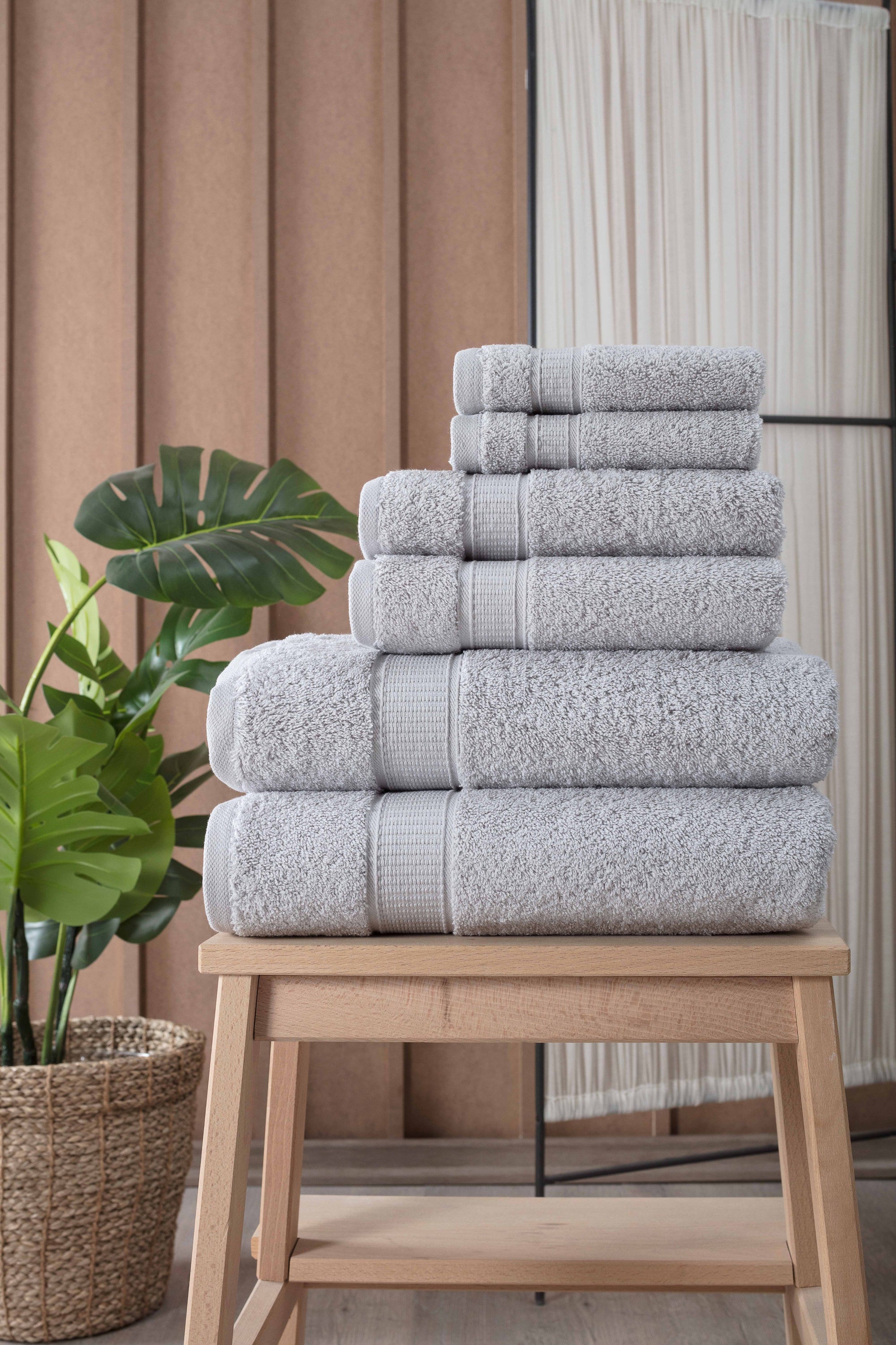 A luxurious set of 6 Turkish cotton bath towels in vibrant colors, showcasing their softness and dobby border design.