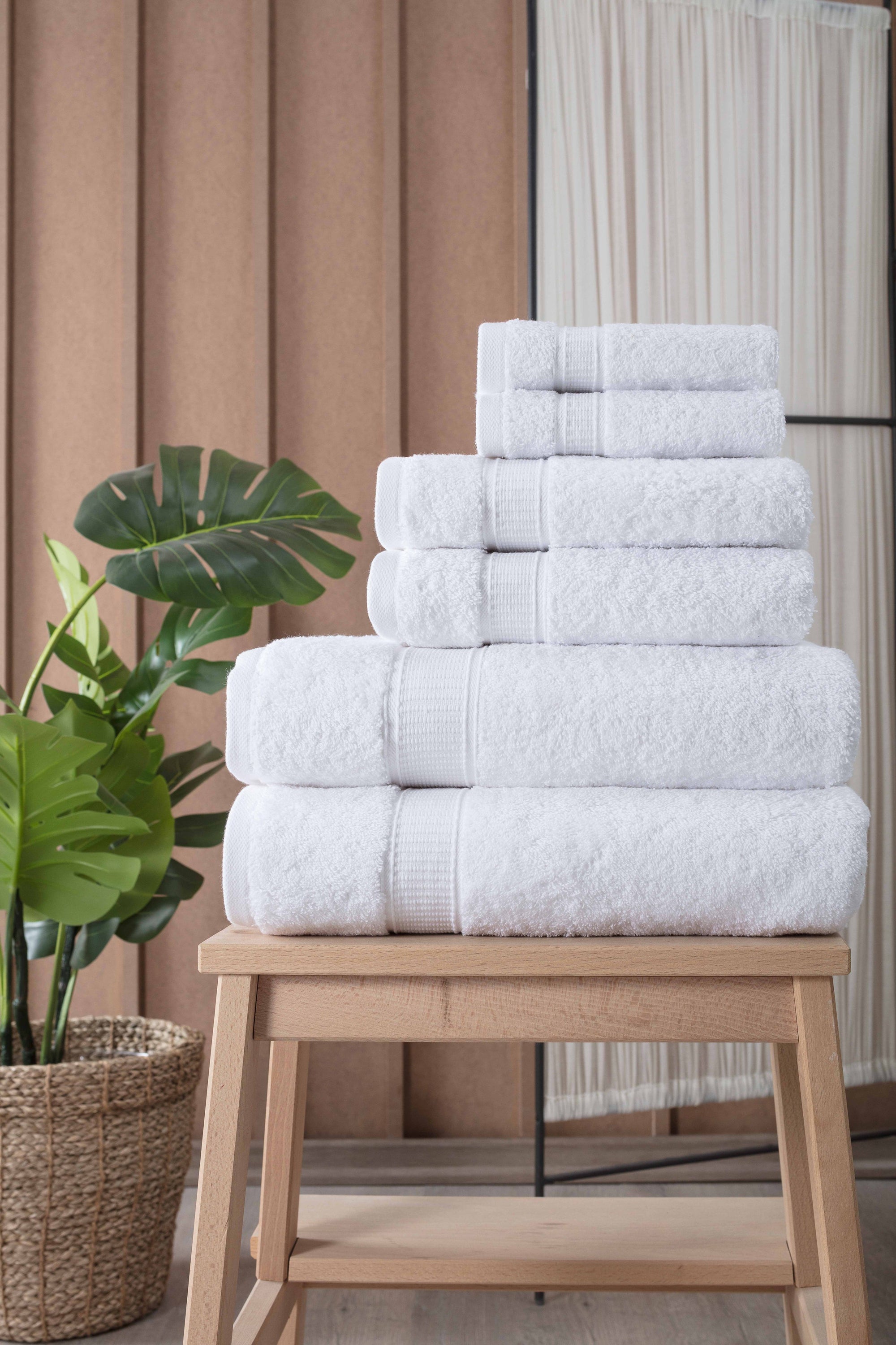 A luxurious set of 6 Turkish cotton bath towels in vibrant colors, showcasing their softness and dobby border design.