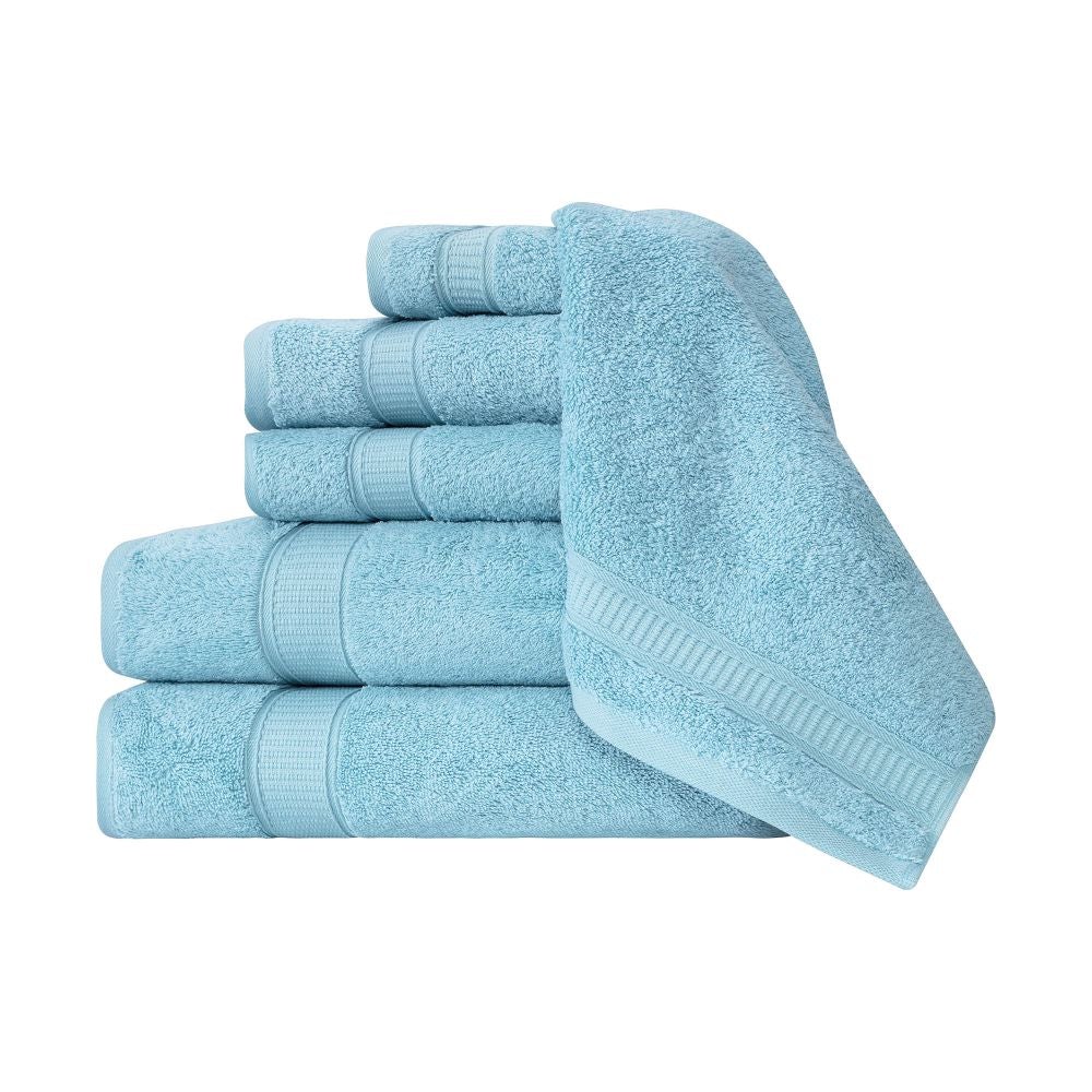 A luxurious set of 6 Turkish cotton bath towels in vibrant colors, showcasing their softness and dobby border design.