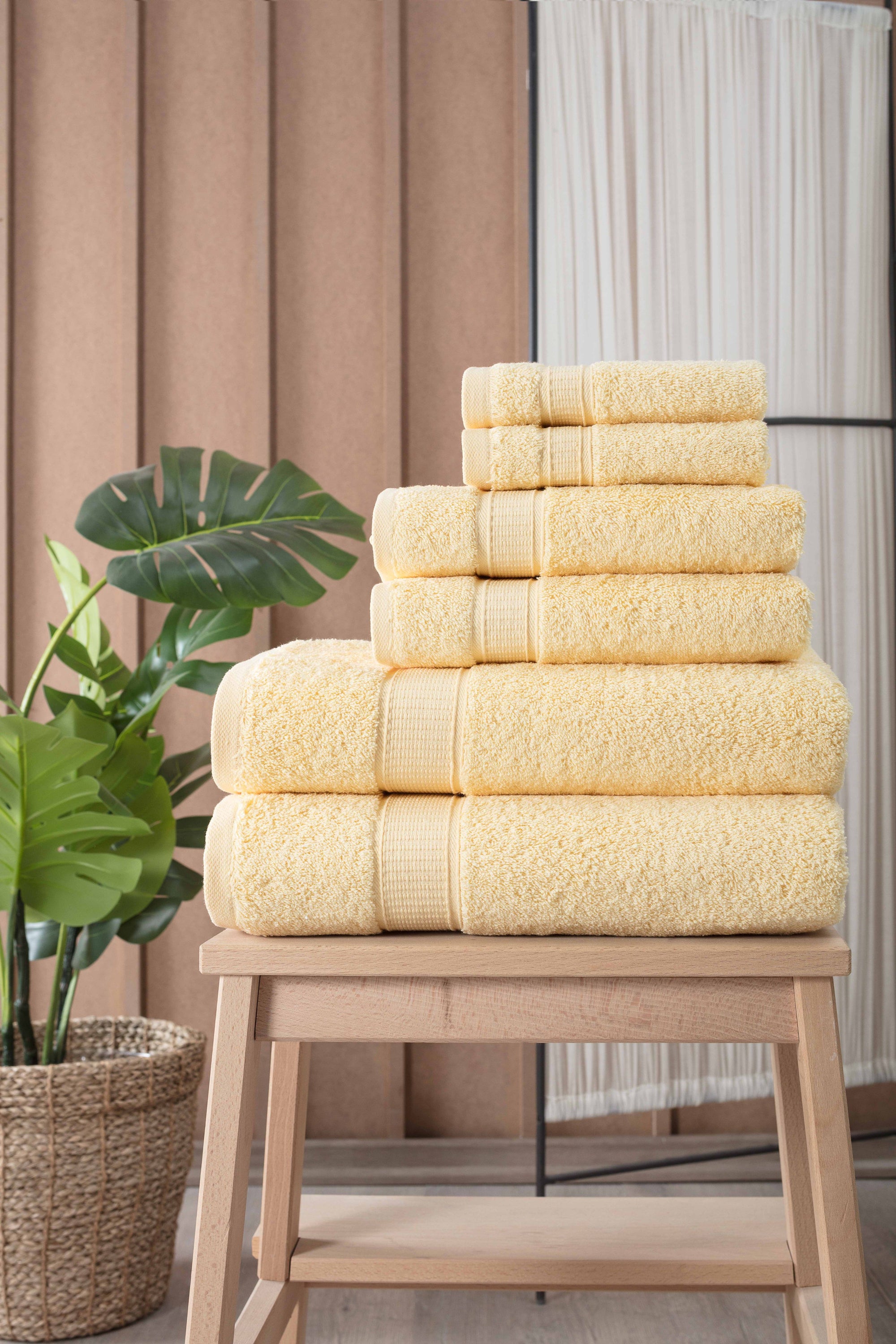 A luxurious set of 6 Turkish cotton bath towels in vibrant colors, showcasing their softness and dobby border design.