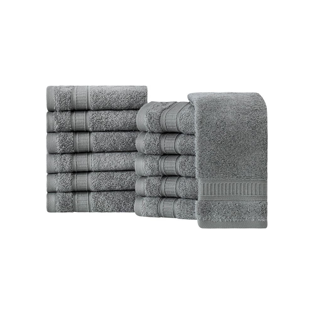 A set of 12 luxurious Turkish cotton washcloths in various vibrant colors, showcasing their softness and dobby border design.