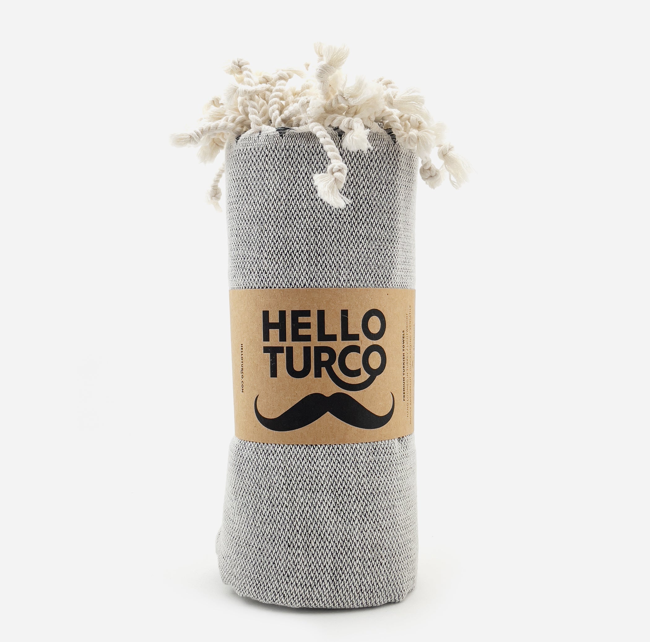 Two Shades Of Gray Handwoven towel made from organic cotton, featuring a rough texture and elegant design, perfect for any bathroom.