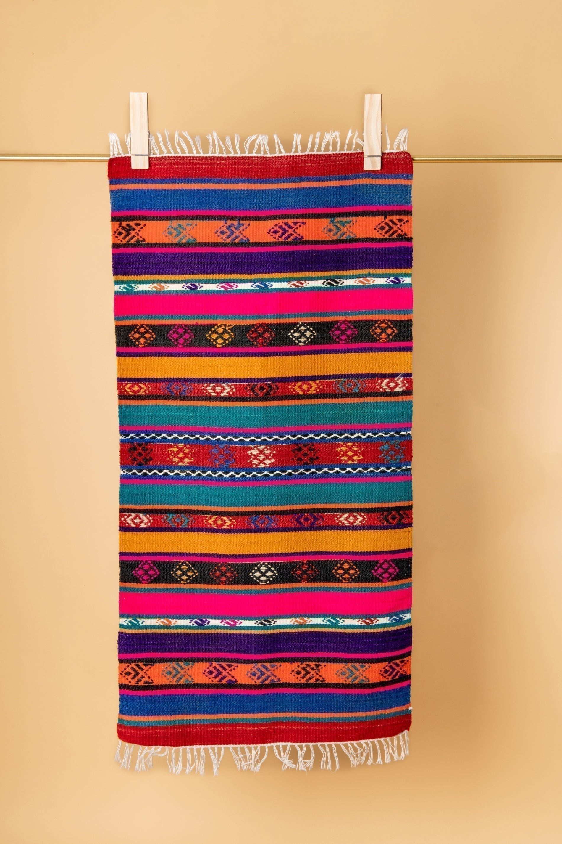 Vintage Turkish Rug measuring 65 x 120 cm, featuring vibrant colors and intricate geometric patterns, hand-spun from natural sheep wool.