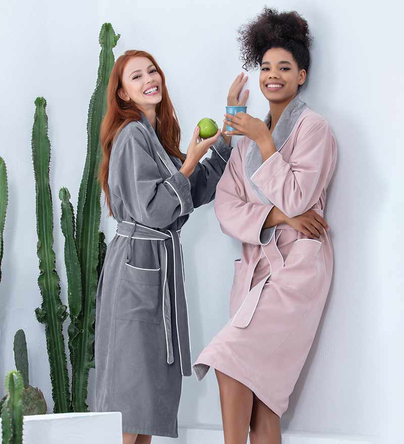 Women's Plush Microfiber Spa Robe in various colors with shawl collar and pockets, showcasing its luxurious fabric and stylish design.