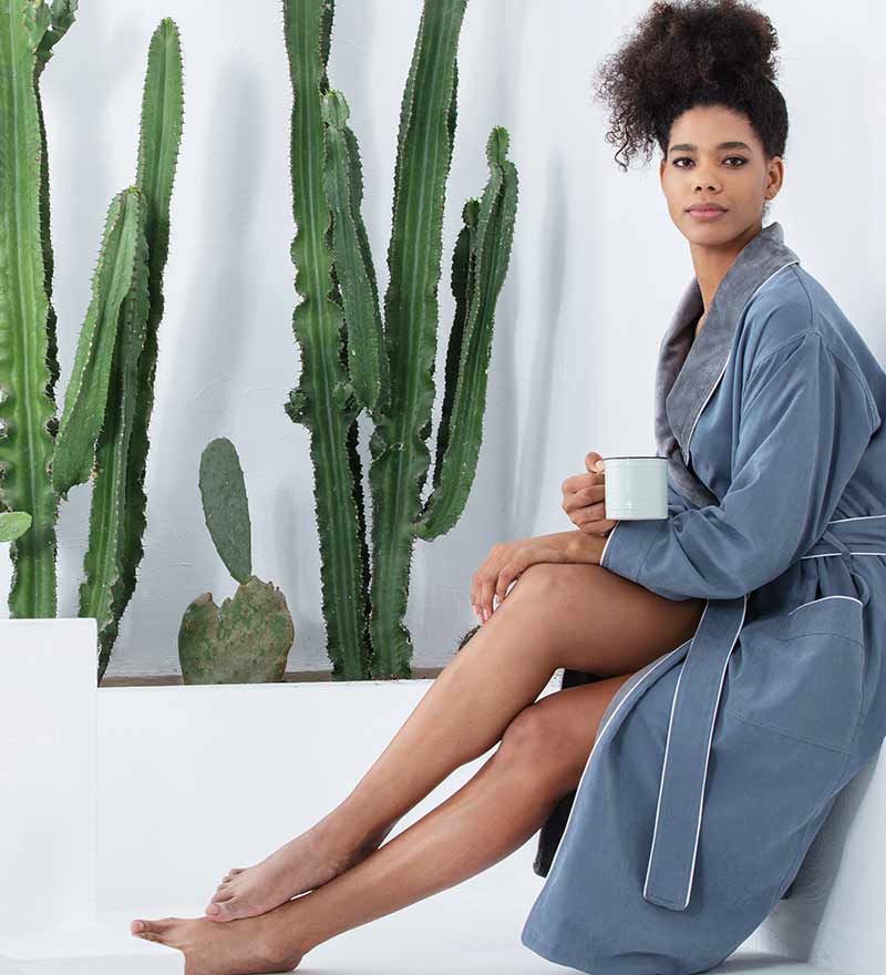 Women's Plush Microfiber Spa Robe in various colors with shawl collar and pockets, showcasing its luxurious fabric and stylish design.