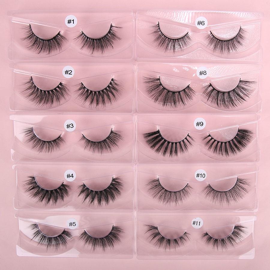 A collection of 10 pairs of natural 3D false eyelashes, showcasing their soft synthetic hair and flexible black cotton bands.