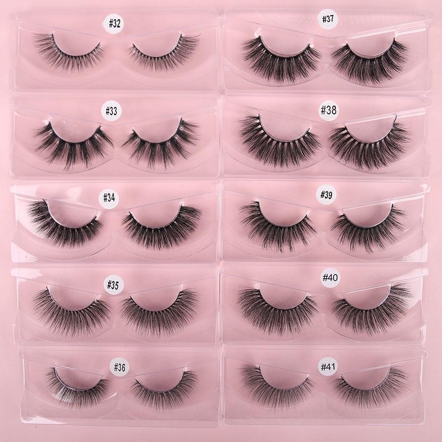 A collection of 10 pairs of natural 3D false eyelashes, showcasing their soft synthetic hair and flexible black cotton bands.