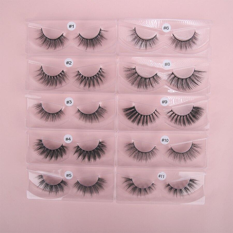 A collection of 10 pairs of natural 3D false eyelashes, showcasing their soft synthetic hair and flexible black cotton bands.