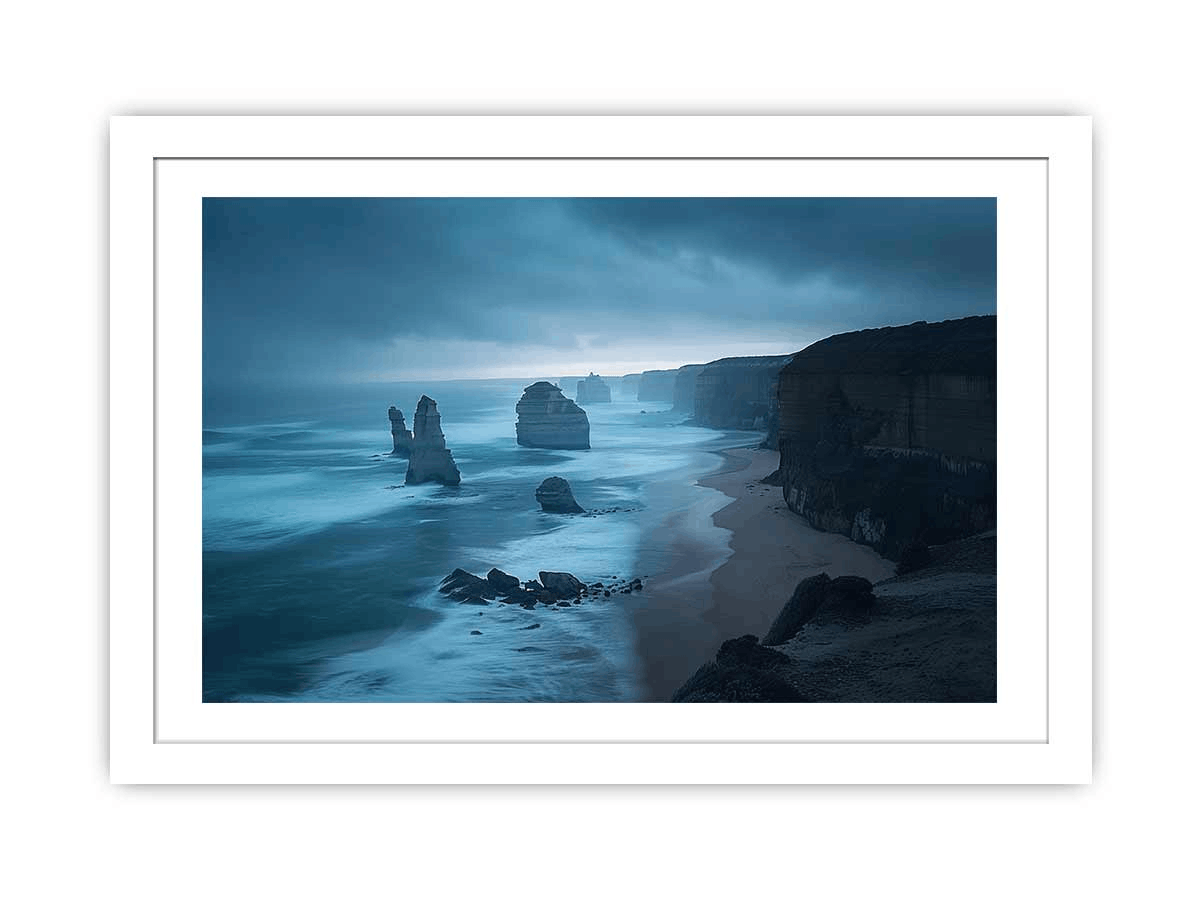 A beautifully framed print of the 12 Apostles, showcasing vibrant colors and intricate details, set in a matte black or white frame.