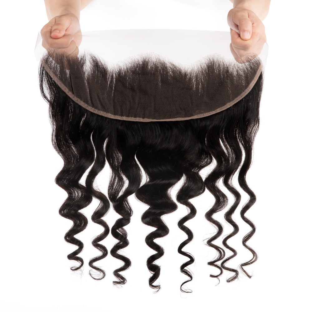 A close-up view of 13×4 Loose Deep Wave Lace Frontals made from 100% virgin human hair, showcasing its natural waves and lace.