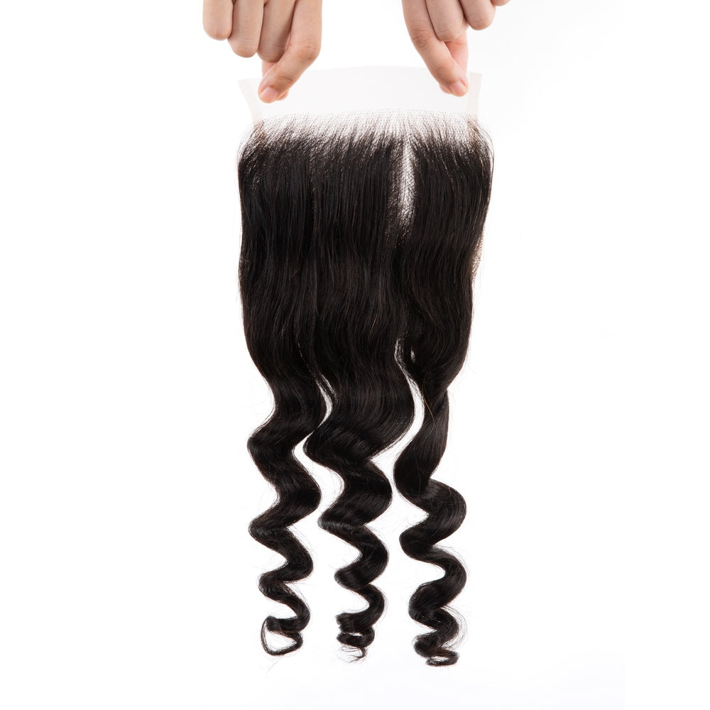 4x4 Premium Human Hair Loose Deep Lace Closure showcasing its natural texture and quality.