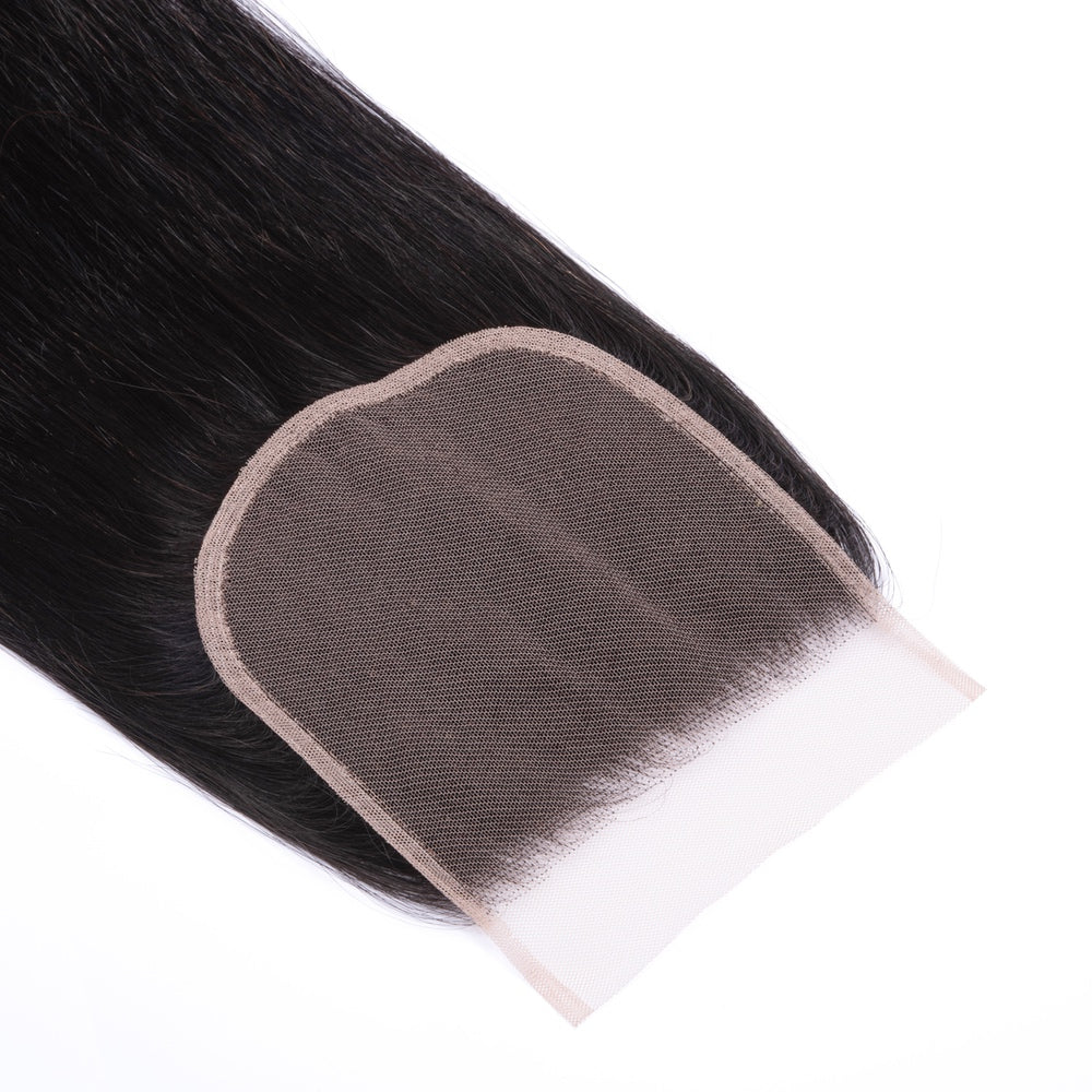 4X4 Straight Hair Free Part Closure made from 100% human hair, showcasing its natural texture and lace material.