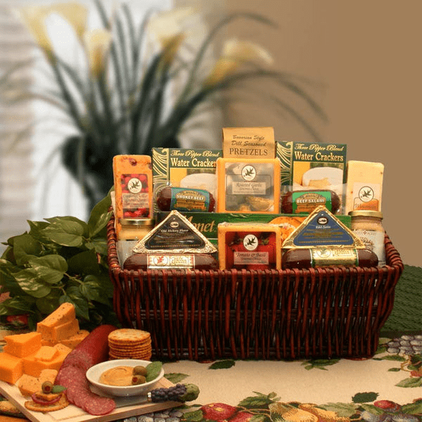 A beautifully arranged gourmet gift basket featuring assorted meats, cheeses, crackers, and mustards, perfect for gifting.