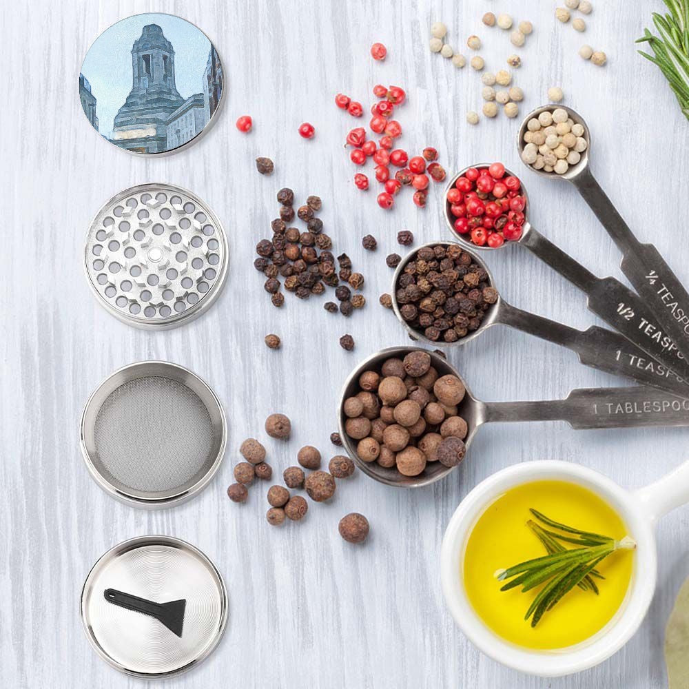 A Grand Place Metal Abrader made of stainless steel, compact and designed for grinding spices efficiently.