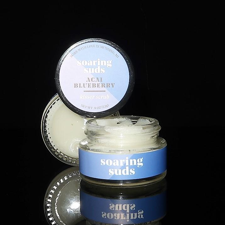 Acai Blueberry Kisser Scrub in a small jar, showcasing its natural ingredients and vibrant color.