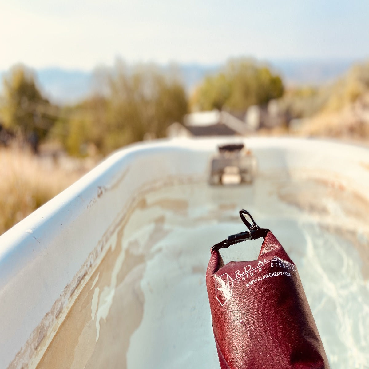 Adventure Bag containing essential outdoor protection and hydration products, designed for outdoor enthusiasts.