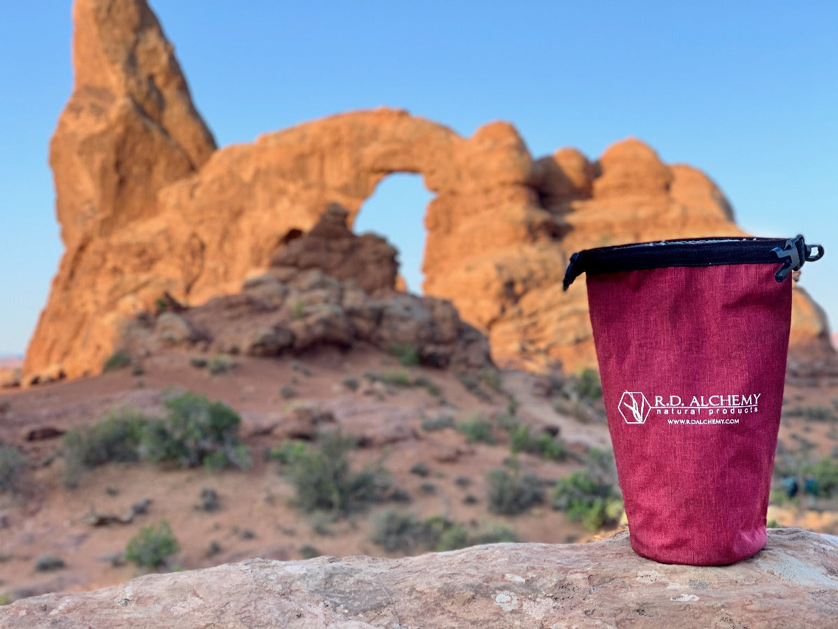 Adventure Bag containing essential outdoor protection and hydration products, designed for outdoor enthusiasts.