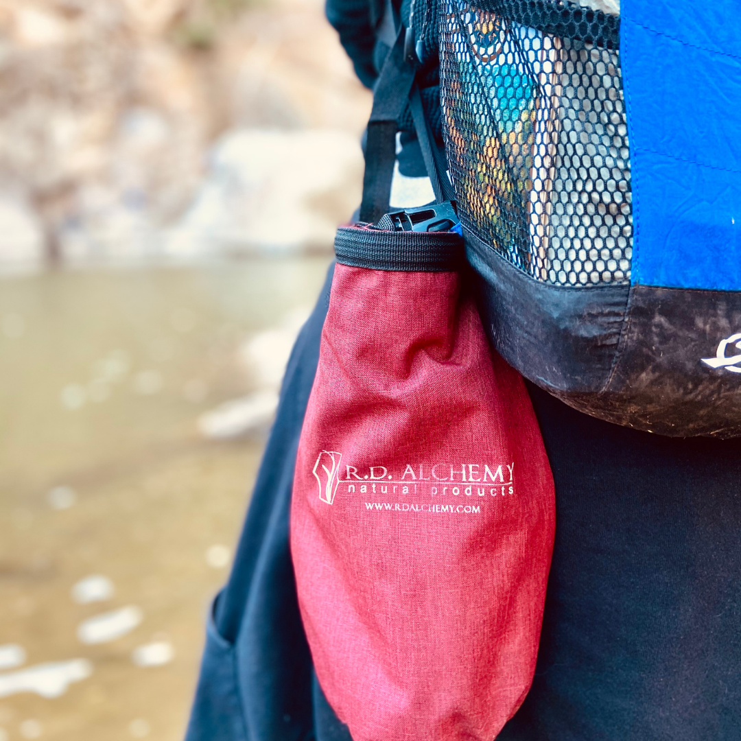 Adventure Bag containing essential outdoor protection and hydration products, designed for outdoor enthusiasts.