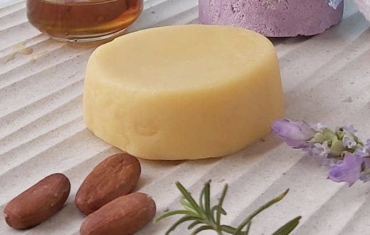 All-Natural Conditioner Bar in citrus scent, eco-friendly and zero-waste, showcasing its compact size and natural ingredients.