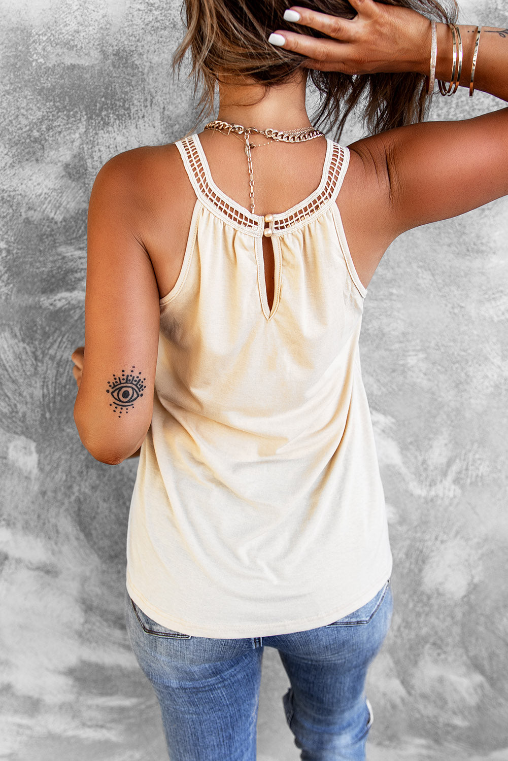 Apricot Crochet Lace Tank Top featuring delicate lace splicing and a flowy pleated design, perfect for summer wear.
