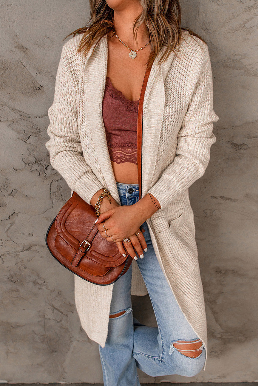 Apricot hooded cardigan with pockets, open front design, stylish knitted fabric, perfect for casual wear.