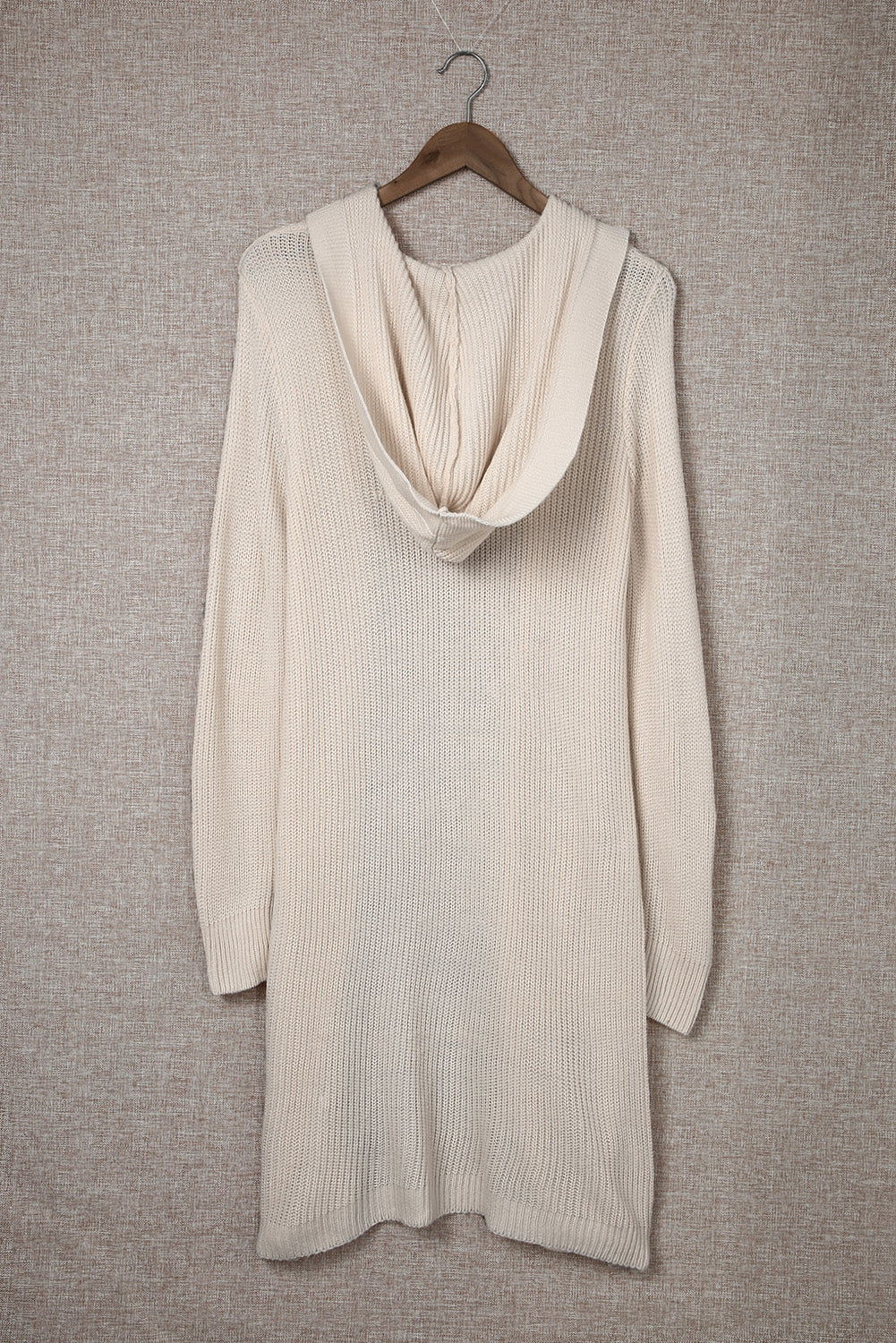 Apricot hooded cardigan with pockets, open front design, stylish knitted fabric, perfect for casual wear.