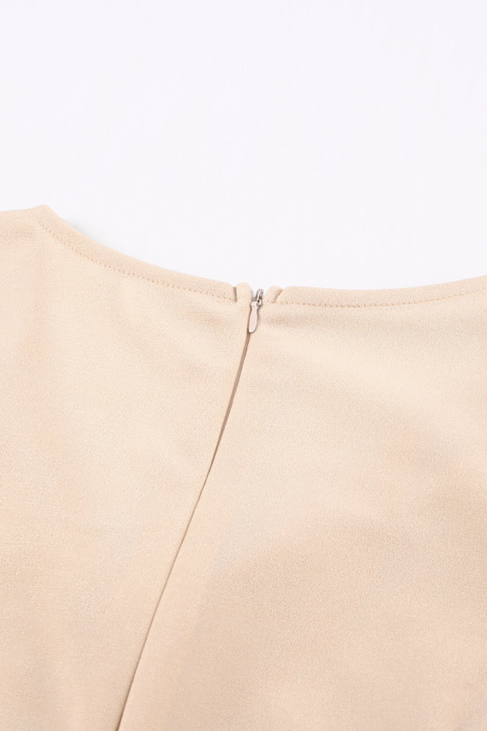 Apricot straight leg jumpsuit with knotted high waist and short sleeves, showcasing a stylish v-neck design.