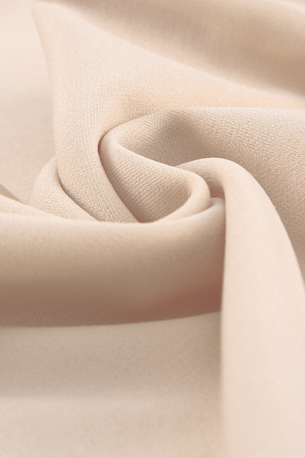 Apricot straight leg jumpsuit with knotted high waist and short sleeves, showcasing a stylish v-neck design.