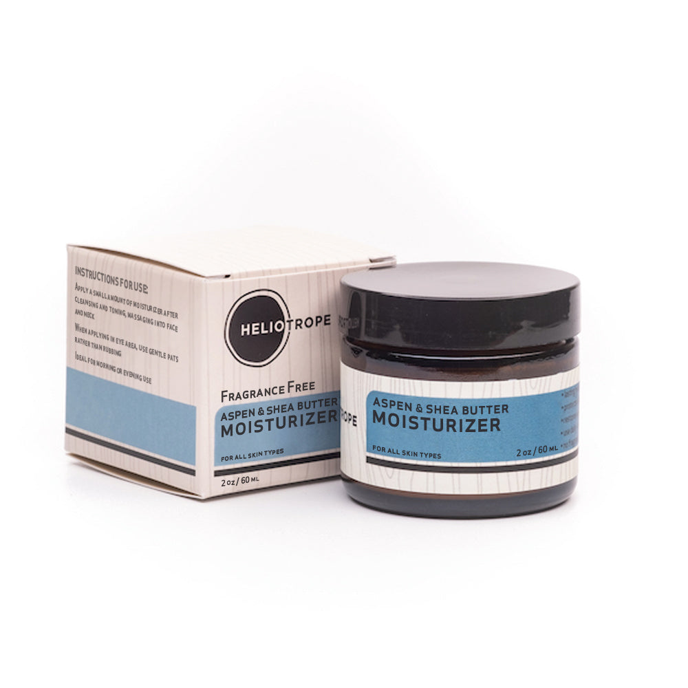 Aspen & Shea Butter Moisturizer in a sleek 2 oz jar, showcasing its creamy texture and natural ingredients.