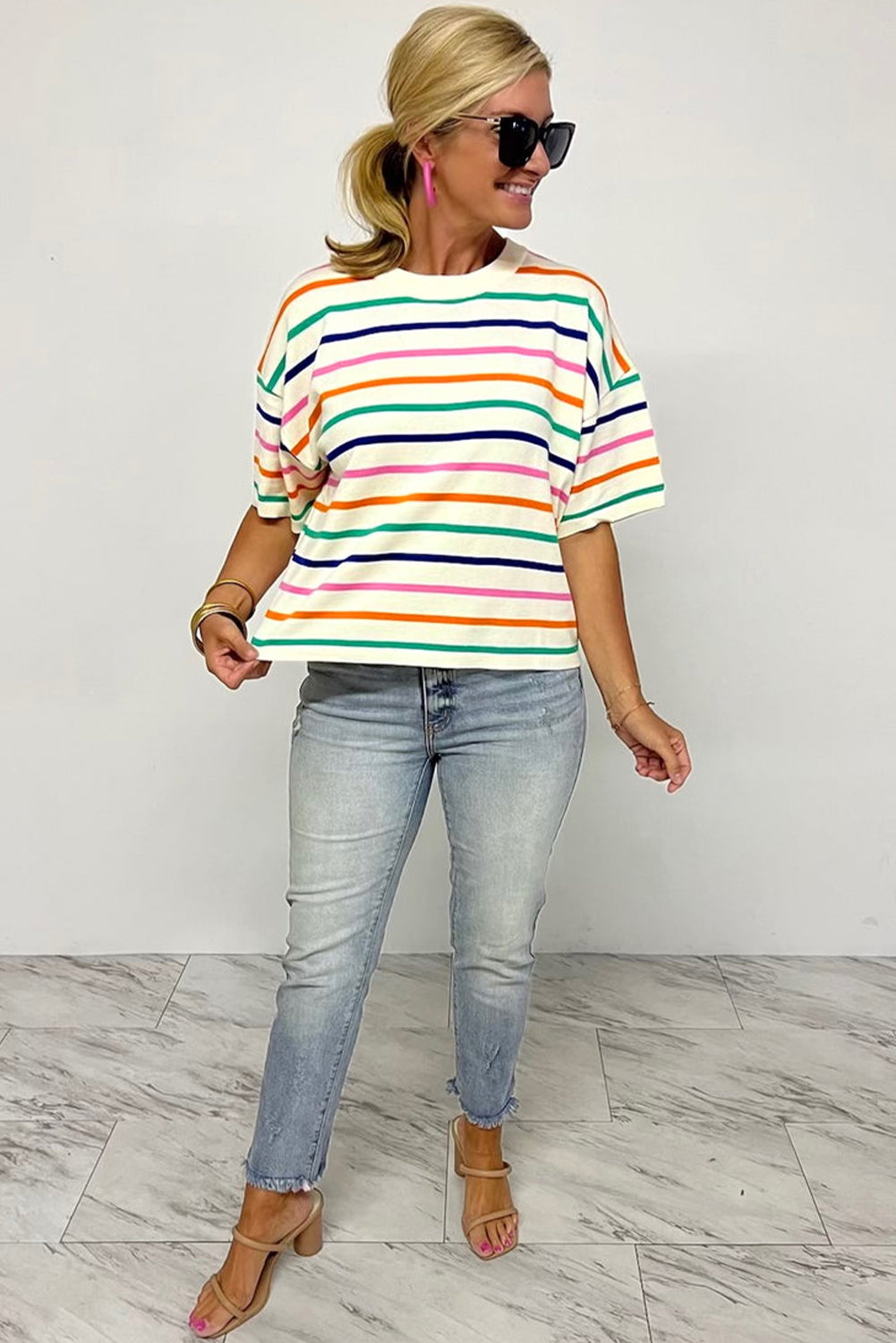 Beige stripe knitted top with dropped short sleeves and boxy fit, perfect for casual wear.