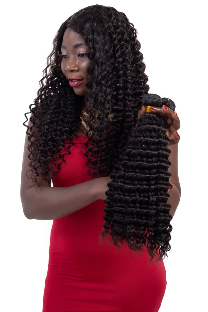 BeuMAX 10A Grade 3/4 Bundles Deep Wave Brazilian Human Hair Extensions displayed in a natural wavy style, showcasing their softness and volume.